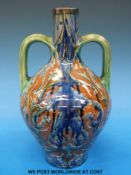 Della Robbia twin handled vase signed Charles Collis (H24cm)