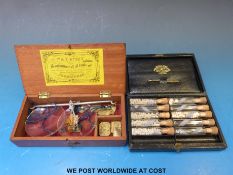 Cased homeopathic bottles with brass scoop by James Epps, 170 Piccadilly,