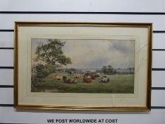 J Macpherson watercolour cattle in field with town beyond (27 x 53cm)