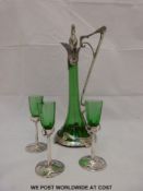 WITHDRAWN   An Art Nouveau white metal and glass ewer and three liquer glasses,