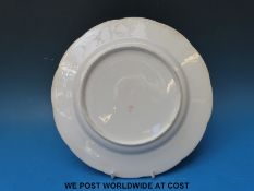 A rare early Derby relief moulded armorial plate with crowned decoration,