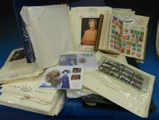A quantity of Royal Family stamp/coin covers and Facility album of world stamps