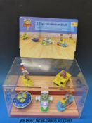 A Shell display stand of '5 toys to collect' including figures and advertising poster