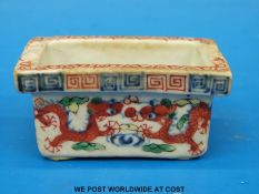 A Chinese Wanli mark and period censer with dragon decoration (8cm long)
