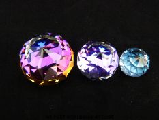 Three Swarovski Crystal faceted garduated glass paperweights all in original boxes (4.5cm, 3.
