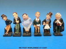 A collection of six Royal Doulton Charles Dickens figures