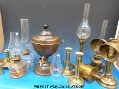 A collection of oil lamps,