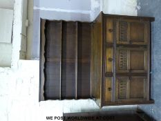 An oak dresser with plate rack above (W136cm D45cm H174cm)