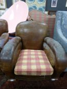 An Art Deco leather arm chair