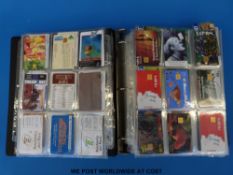 A large album of all world telephone cards including sport, glamour, film, wildlife etc.