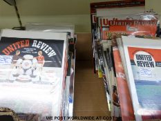 Over 150 Manchester United football programmes 'United Review' dating from 1960's onwards including