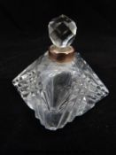 A cut glass scent bottle with 9ct gold collar, hallmarked 1906 B & Co.