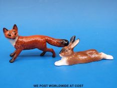 A small Beswick fox together with a small Royal Doulton hare