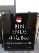 A collection of Bin Ends at the Bear signs and a blackboard