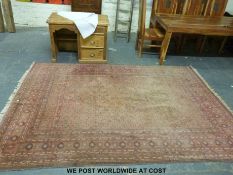 A red ground Turkoman rug (200x300cm approx)
