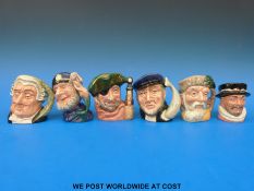 Six small Royal Doulton character jugs