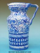 A blue and white water jug