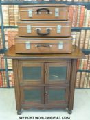 An unusual mahogany cupboard, possibly ex-shop, with glass doors,