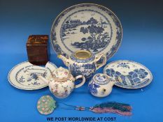A collection of oriental ceramics including an 18thC polychrome teapot, silk purse,