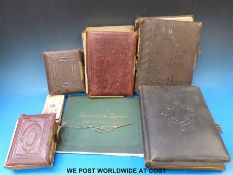 Five photo albums of interesting family portraits from the 19thC and a coloured portrait