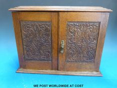 A late 19th/early 20thC oak smoker's cabinet