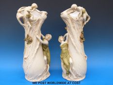 A pair of large Royal Dux figural arborial vases with nymphs and putti (43cm tall)