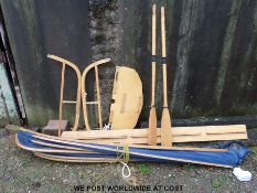 A collapsible folding canoe with oars, life jackets,