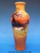 A Royal Doulton vase with hand painted scene of Highland cattle,