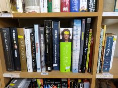 A collection of hardbacks and paperback biographies on John Lennon,