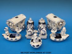 Seven Wilfred Gibson blue and white ceramic items, three boats,