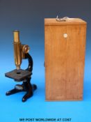 A Philip Harris & Co cased mircoscope