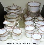 A late Victorian Copeland & Garrett tea set, teapot with stand, milk, sugar basin, sandwich plates,