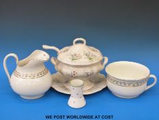 A large soup tureen, ladle and under-plate,