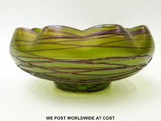 Kralik threaded iridescent glass bowl with waved rim and plum thread on green ground (16cm in