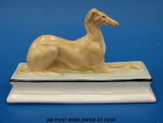 A Michael Sutty figure of a greyhound with Sutty stamp to base
