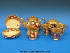 A part painted fruit tea set by ex Royal Worcester artist James Skerrett