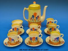 A Clarice Cliff Bizarre coffee set in the crocus pattern