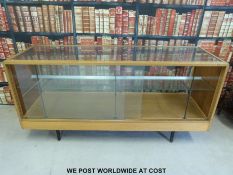 A vintage oak shop display / haberdashery counter with glass shelving (length 183cm)