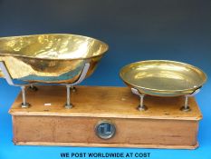 Shop-fitting haberdashery interest: A large set of scales the large brass pans impressed with proof