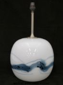 Michael Bang for Holmegaard glass lamp of compressed circular form with streaked blue decoration on