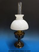 Brass oil lamp with glass shade