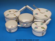 A collection of retro ceramic Limoges Aluminite Frugier saucepans with hot air balloon decoration,