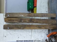 Three wooden beams