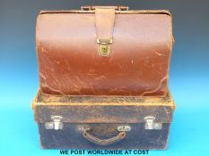 A leather doctor's Gladstone bag with fitted interior,