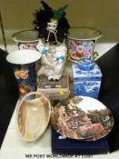 A pair of Campana-shaped vases, a Royal Doulton flared case, a Ringtons tea caddy,