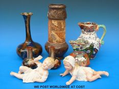 An Eltonware style vase, two smaller examples, two jugs,