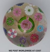 Clichy spaced millefiori glass paperweight with central large signature pink and green rose cane