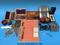 Two drawing sets, a pair of opera glasses, medical / surgical instruments by Baker, London,