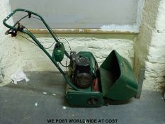 A Qualcast Classic Petrol 43s petrol lawn mower
