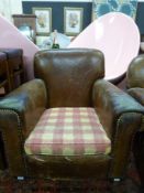 An Art Deco leather arm chair